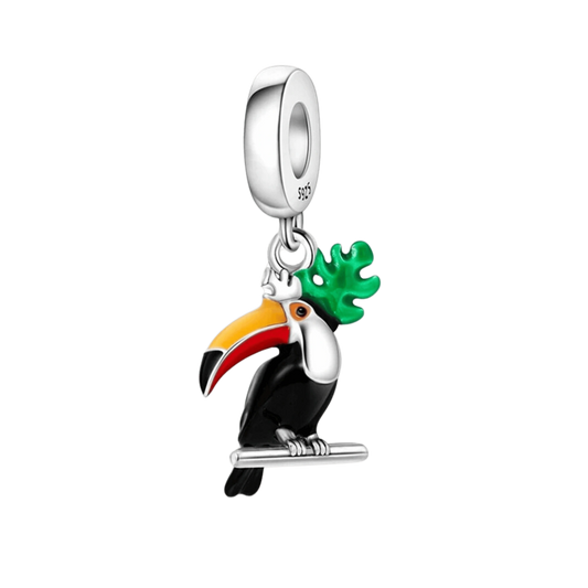 Charm Toucan sur une branche